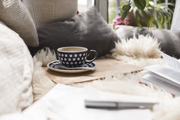 Coffee cup at blanked bed