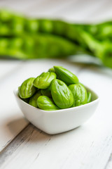 Petai, Bitter Beans on wood table, Thai vegetable food, Parkia speciosa seeds