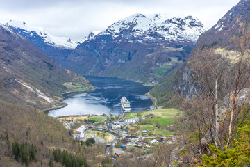 Fototapeta na wymiar View of Geiranger and a cruise ship in the fjord from Flydalsjuvet, Norway