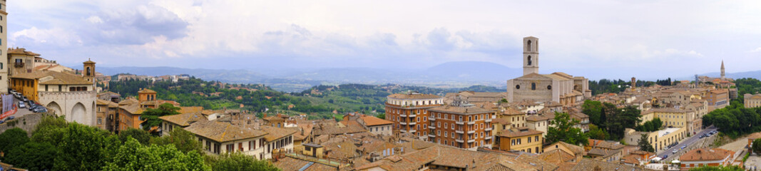 Perugia, Italy - panoramic view of Perugia, capital city of Umbria district, with surrounding mountains and valleys in the background - obrazy, fototapety, plakaty