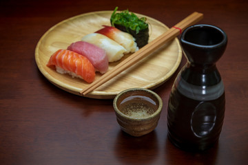sake cup with sushi