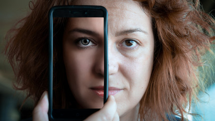 Woman Holding a smartphone covering half of her face, showing the transformation of Before and...