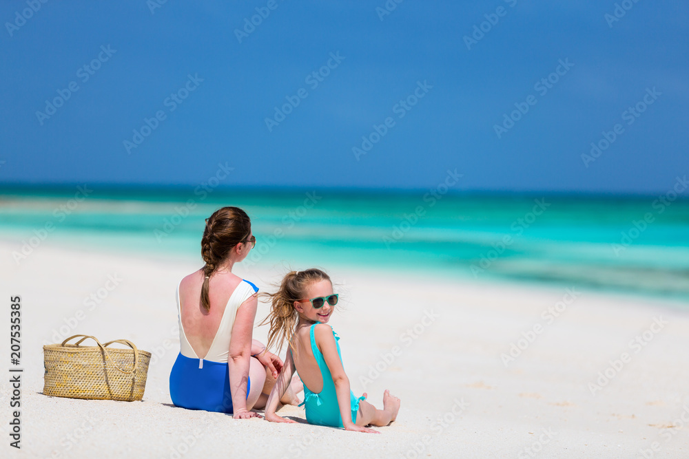 Sticker mother and daughter at beach