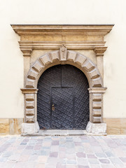 Old metal arch door