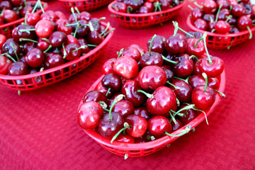 Cherries in Baskets at Farmers' Market in California