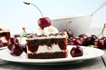 Chocolate cake with cherries and whipped cream. Black Forest cake