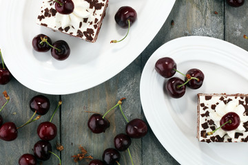 Chocolate cake with cherries and whipped cream. Black Forest cake