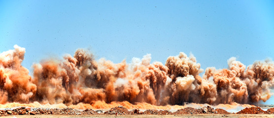 Dust storm after detonator blast in the Arabian desert
