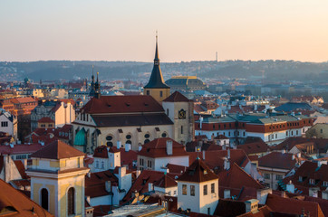 Obraz premium Sunset in Prague, Czech Republic. Aerial view at the scenic cityscape with red roofs of old town