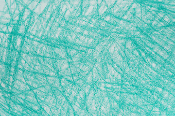 green crayon doodles on paper background texture