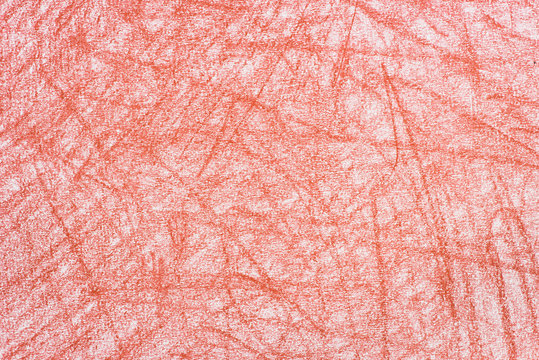 red crayon doodles on paper background texture