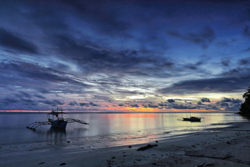 Obraz premium Balangay or bangka boats stranded on the beach. Punta Ballo-Sipalay-Philippines. 0485