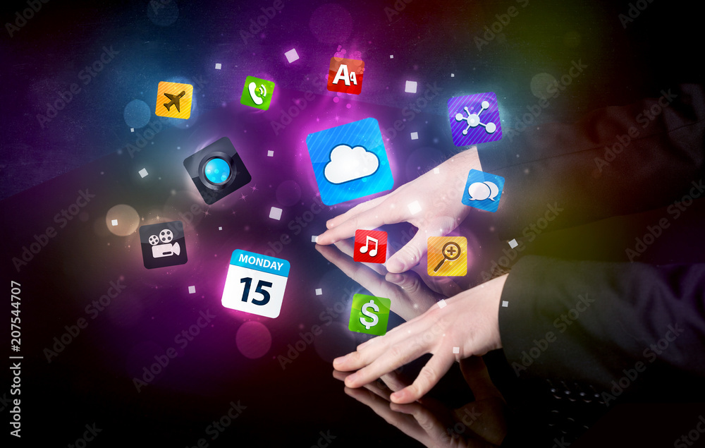 Poster male hands touching interactive table with colorful application icons on it