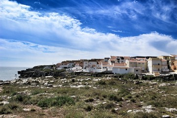 Views of the Peniche village and wild Atlantic Ocean with beautiful cliffs