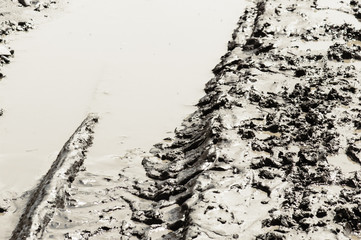 Tire tracks in the mud closeup