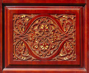Wood carving in the form of a skilful floral pattern. Backgrounds