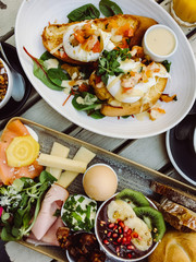 Healthy breakfast with coffee and poached eggs 