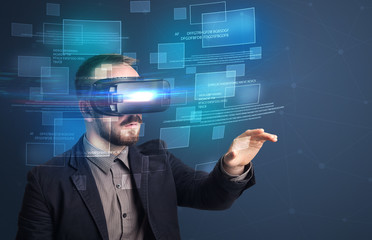 Amazed businessman with virtual reality data and blue squares in front of him 
