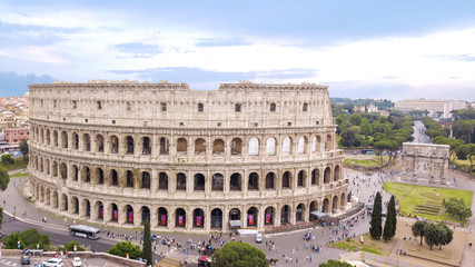 Fototapeta premium Aerial view of the Colosseum, known as Amphitheatrum Flavium, symbol of the city of Rome, of Italy and one of the seven wonders of the world. In ancient times it was used for gladiatorial shows.