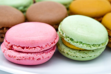 Sweet colorful macarons isolated on white background