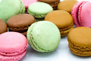 Sweet colorful macarons isolated on white background