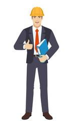 Businessman in construction helmet holding a folder and showing thumb