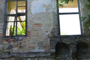 two old broken windows in castle