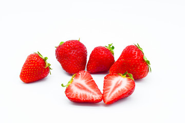 Slices of strawberry isolated on white background