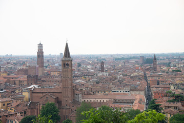Fototapeta na wymiar View of Verona skyline in Verona, Italy. View of Santa Anastasia and Torre dei Lamberti.