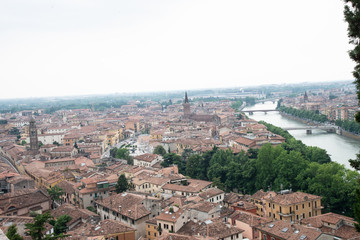 Fototapeta na wymiar View of Verona skyline in Verona, Italy. View with river adige, santa maria in organ, san tomaso
