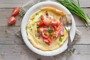 Dutch baby with ham and tomato