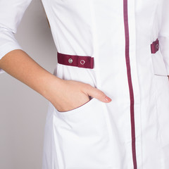 Fototapeta na wymiar white medical gown. fragment
