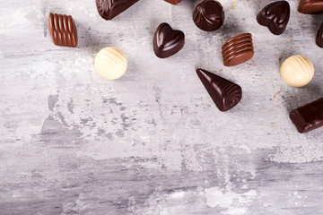 Border pattern of photos assortment of chocolate candies