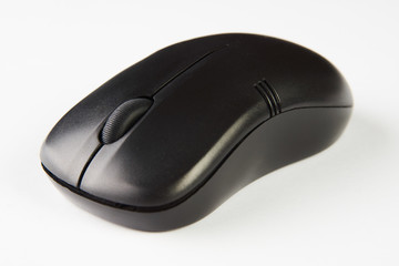 Wireless computer mouse isolated on white background, close-up. Black optical computer mouse.