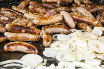 Wild Boar Sausage and Onions on grill