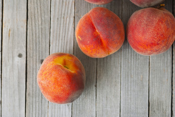 Peaches on wooden