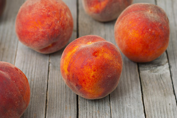 Peaches on wooden