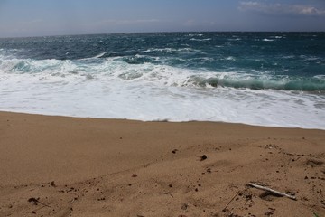 Crystal clear and wild waters in Praia da Foz, Sesimbra, Portugal