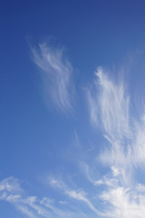 High cirrus clouds and blue sky