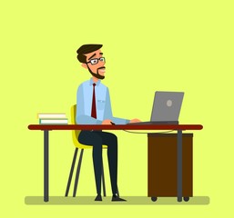Happy businessman working on a personal computer, sitting on a brown leather chair behind the office desk.