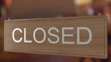 Door sign is turned over from OPEN to CLOSED