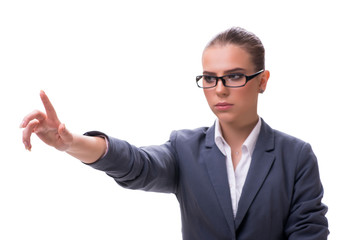 Young businesswoman pressing virtual button on white