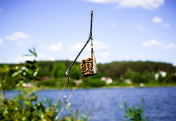 Filled feeder for fishing on a the line