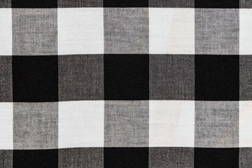 Fototapeta premium Square texture on fabric, men's shirt black and white