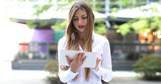 Young businesswoman using a digital tablet 