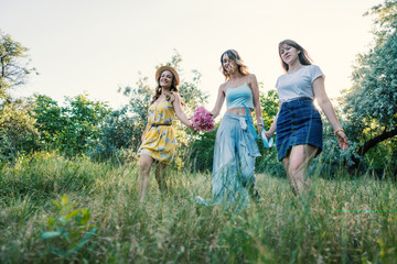 Three girls friends outdoor in the park or forest. bachelorette, party