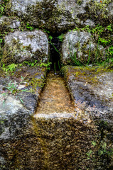 Stone built terracing and buildings at Machu Picchu, an ancient Inca archaeological site near Cusco, Peru