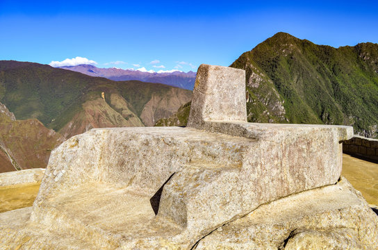 The Intiwatana (or Inti Watana), a ceremonial stone located within the Machu Picchu archaeological site. Cusco, Peru.