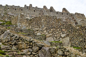 Stone built terracing and buildings at Machu Picchu, an ancient Inca archaeological site near...