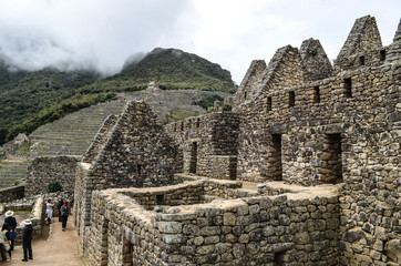 Stone built terracing and buildings at Machu Picchu, an ancient Inca archaeological site near Cusco, Peru